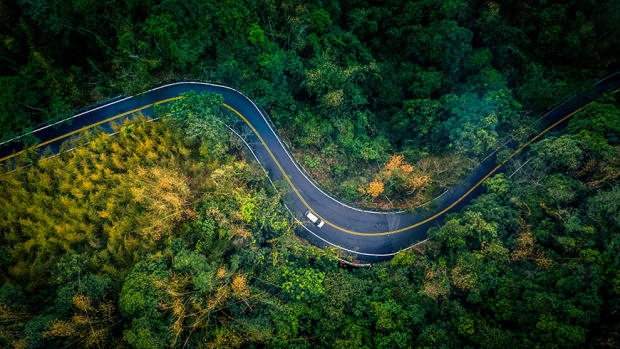 aerial-view-car-road-forest-870x490