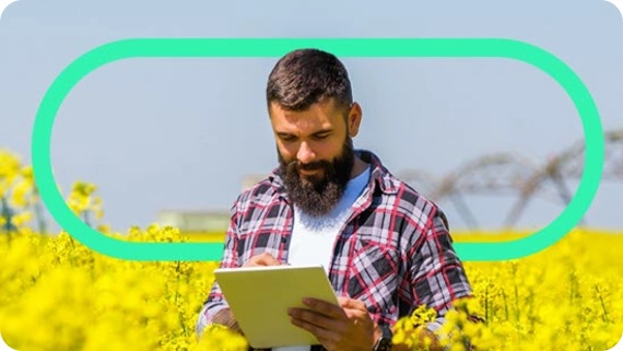 Man in a field with tablet ORAN eBook 550x310
